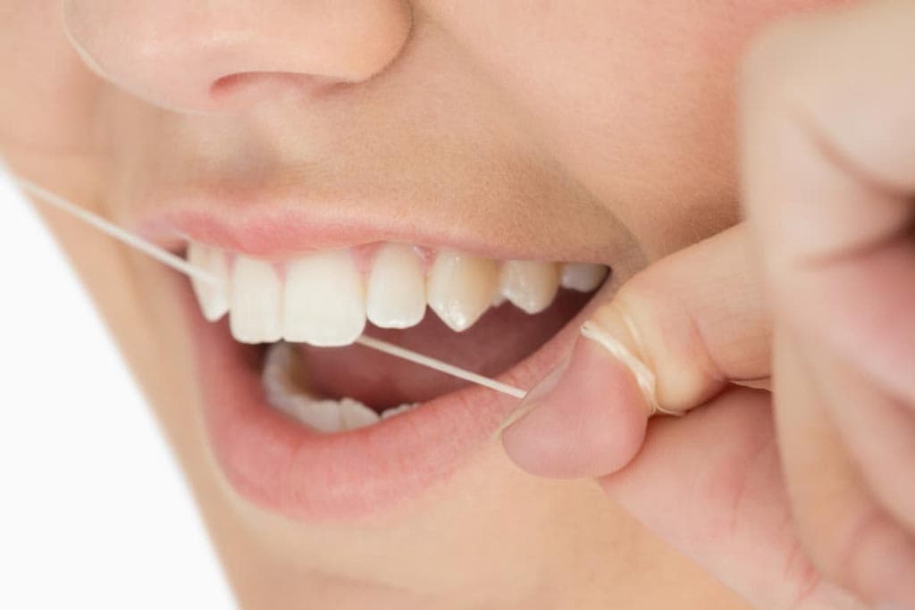 Uso correcto de la seda dental